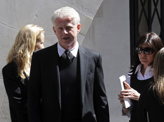 Clement Freud funeral: Richard Curtis and his wife Emma leave the funeral of Clement Freud  