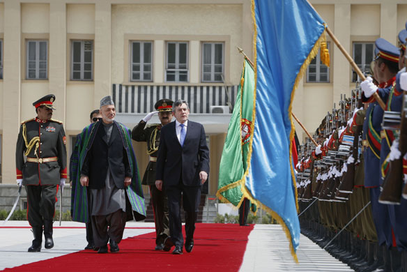 Gordon Brown Afghanistan: Gordon Brown and Afghan leader Hamid Karzai inspect Afghan guards of honor