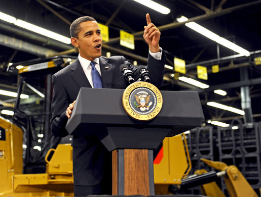 obama 100 days : Barack Obama speaks on the economy during a visit to Caterpillar in Peoria