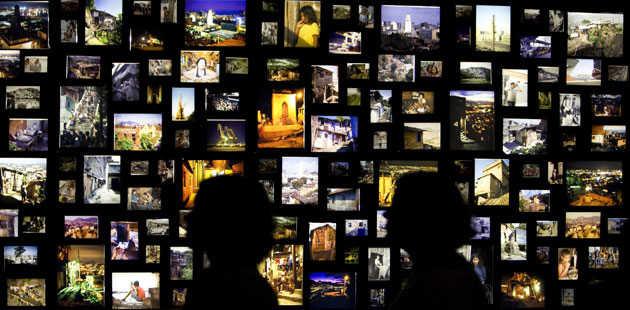 28 April 2009: Rio de Janeiro, Brazil: Two women view the work of Mauricio Hora