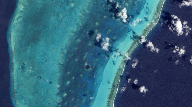 Satellite Eye: the Great Blue Hole and Lighthouse Reef in the Caribbean Sea