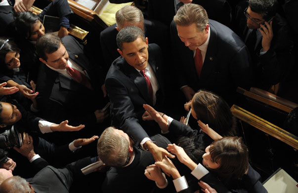100 days obama: US President Barack Obama greets guests after a Joint Session of Congress