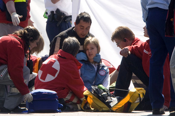 Netherlands car crash: Emergency services tend to an injured woman