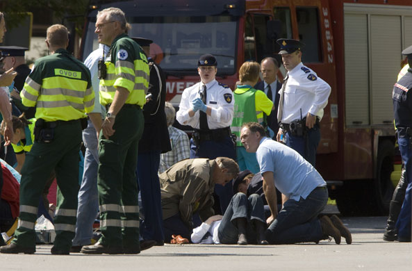 Netherlands car crash: Emergency services tend to injured people