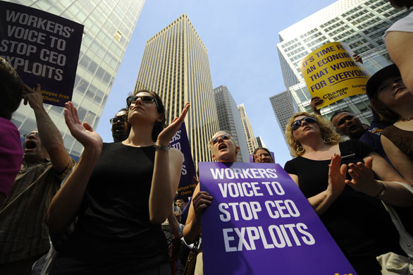 Week in Business: Union workers stage a protest against Bank of America's CEO Ken Lewis.