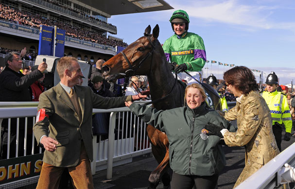 Grand National: Mon Mome is led to the winner's enclosure