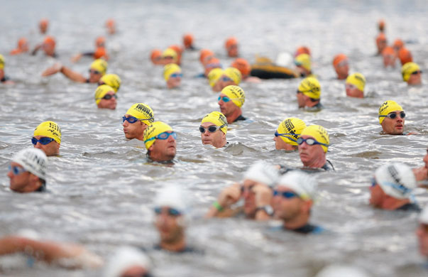 5 April 2009: Competitors prepare for the start of the swim leg of Ironman Australia