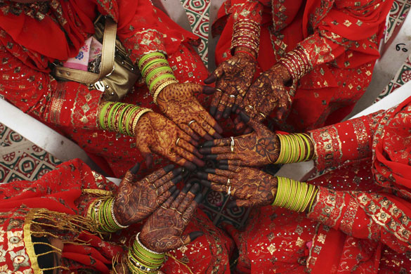 5 April 2009: Ahmedabad, India: Muslim brides during a mass wedding ceremony