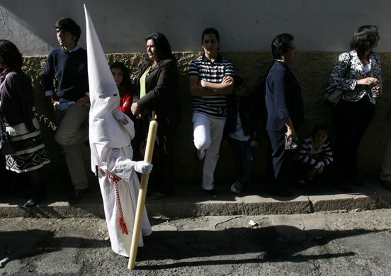 Penitents in Spain: A penitent of the Entrada Triunfal brotherhood in Cordoba