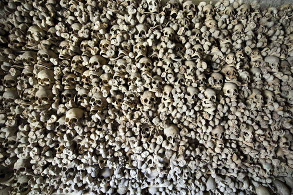 6 April 2009: Wamba, Spain: Skulls and bones are displayed inside a shrine
