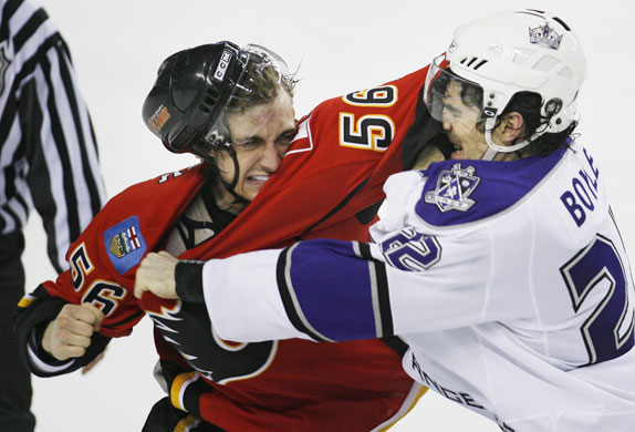 Sport: 24 Hours: Los Angeles Kings' Brian Boyle, fights with Calgary Flames' Matt Pelech