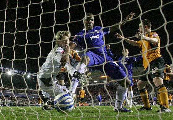 Sport: 24 Hours: Birmingham City's Jerome scores past Wolves goalkeeper Hennessey