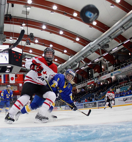 Sport: 24 Hours: Canada's Jennifer Botterill watches her team score against Sweden