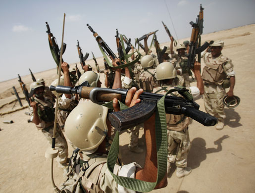 24 hours in pictures: Iraqi army soldiers celebrate during training