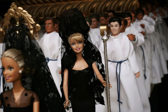 24 hours in pictures: Barbie dolls dressed up as traditional mantillas