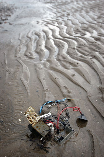 Beach litter: Prestwick: Broken electrical equipment and general rubbish