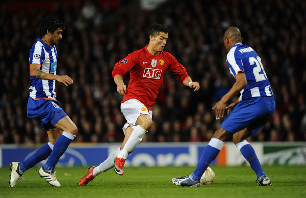 Manchester United v Porto: Ronaldo attacks Lucho and Fernando.