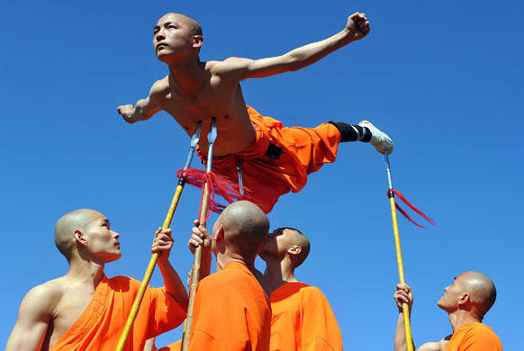 24 hours in pictures: Shaolin Wu-Shu Warriors perform