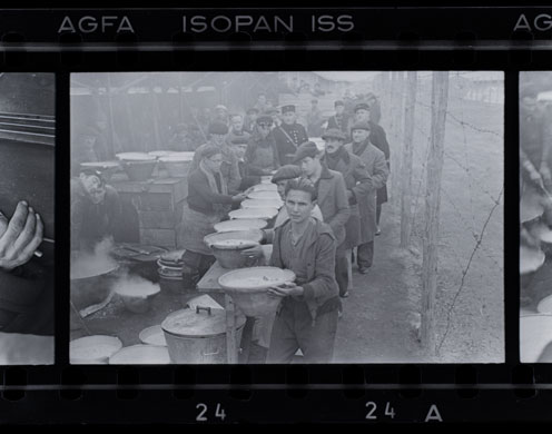 Spanish civil war negs: Robert Capa, Distribution of food at Spanish refugee camp.