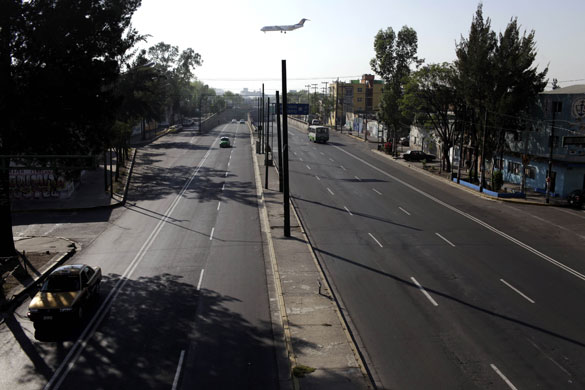 Mexico swine flu: An empty avenue next to the airport in Mexico City.