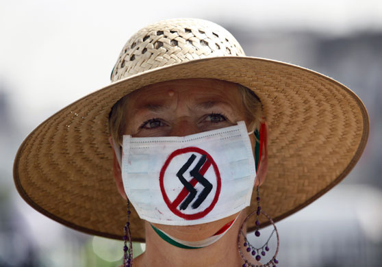 Swine flu face masks: A woman wears a surgical mask in Mexico City