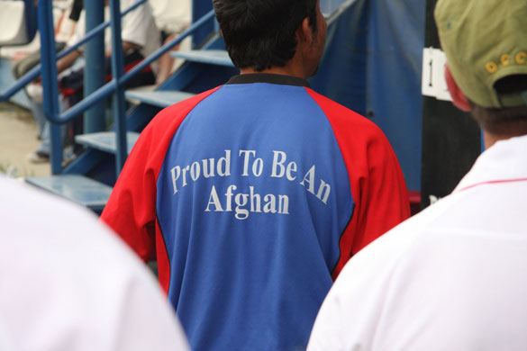 Afghanistan cricket: A man wears a shirt saying Proud to be Afghan 