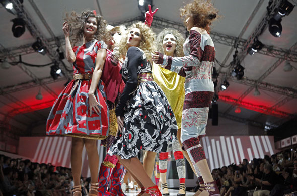 24 hours in pictures: Models pose on the runway wearing Vivienne Westwood