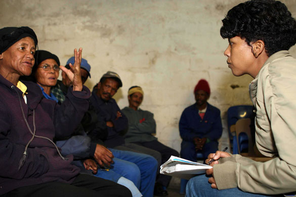 Tesco fruit farms: Wendy Pekeur, of Sikhula Sonke holds a meeting in a farm workers' hall