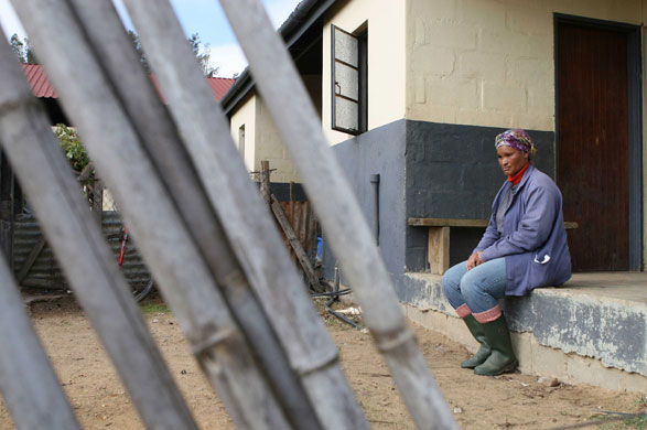 Tesco fruit farms: Kitty de Kock, who struggles to make ends meet, outside worker housing