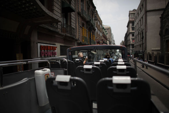 12 May 2009: Mexico City, Mexico: A tourist from the Netherlands takes pictures