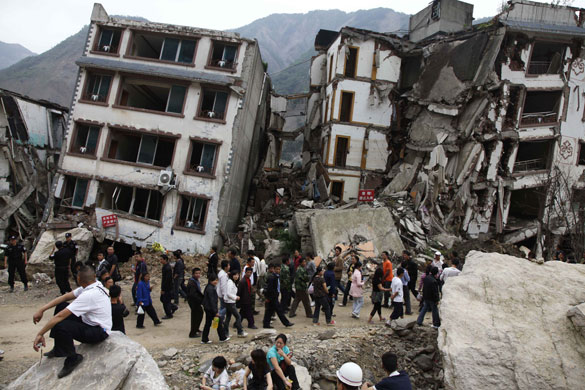 12 May 2009: Beichuan, China: People visit the quake devastated town