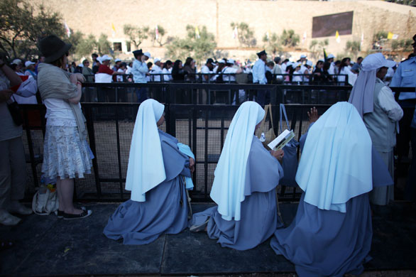 Pope Benedict XVI: Nuns pray as Pope Benedict celebrates a holy mass at the Kidron Valley