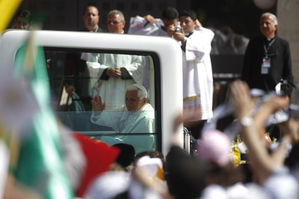 Pope Benedict XVI: Pope Benedict XVI waves from his pope mobile