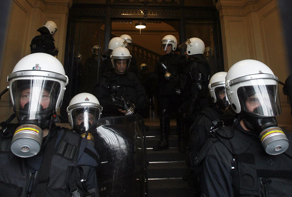 ArcelorMittal: Policemen guard the entrance to a shareholders' meeting of ArcelorMittal