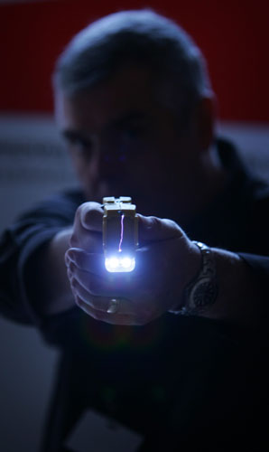 Star Trek technology: A representative from Taser International fires the company's X26 stun gun