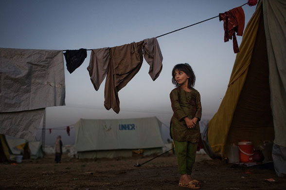 Eyewitness: A young girl outside her tent in the Chota Lahore relief camp