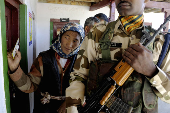 India Elections 5th Stage: A Ladakhi women waits to vote in the Indian elections