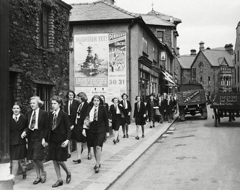 School uniforms: 1940s: Girls From Roedean School walk through the streets of Keswick