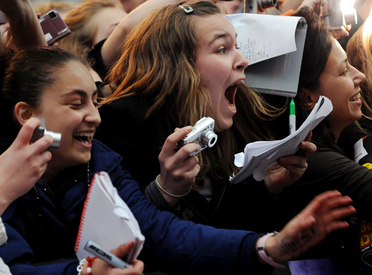 14 May 2009: London, UK: Fans wait to catch a glimpse of the Jonas Brothers