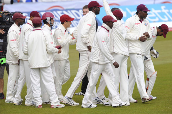England v West Indies: Chris Gayle leads his team out 