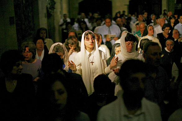 15 May 2009: Nazareth, Israel: Believers follow a vesper celebrated by Pope Benedict XVI