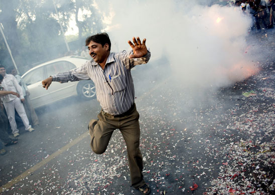24 hours in pictures : Opposition Party BJP Concede Defeat In India's General Election