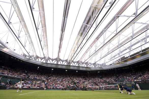 Eyewitness: Tim Henman and Andre Agassi take part in a mini-tournament