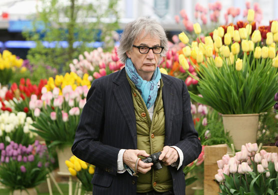 Chelsea Flower Show: Sir Paul Smith takes photographs during the Press and VIP preview day