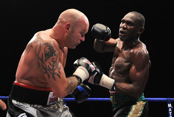 24sport: Ovill McKenzie launches a big right towards John Keeton