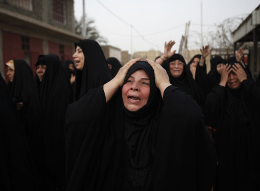 21 May 2009: Baghdad, Iraq: Women during the funeral of a victim of a car bomb explosion