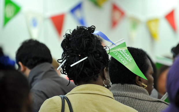 Week in Business: A woman wears a promotional Marks and Spencer flag