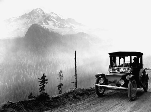 Green technologies: Electric Car Driving to Mount Rainier