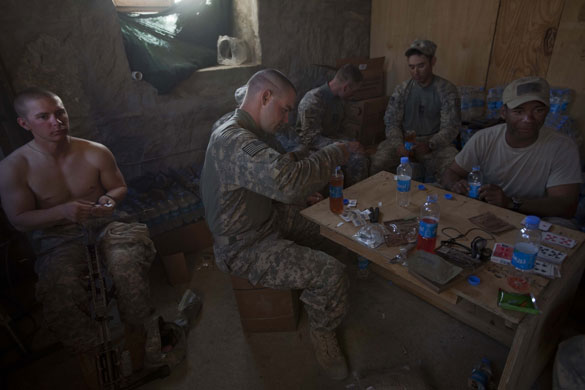 Sean Smith in Afghanistan: American Army troops from Apache Company rest at FOB Tarwah. 