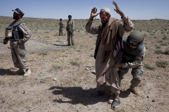 Sean Smith in Afghanistan: Afghan border police search villagers near FOB Tarwah